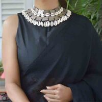 Model wearing Afghani Tribal choker with two line cowrie shells embedded design