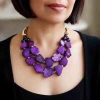 Free form purple dyed quartz necklace on model