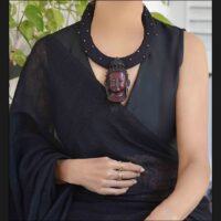 Fabric necklace with Buddha pendant