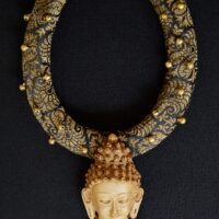 Fabric necklace with Buddha pendant