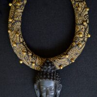 Fabric necklace with Buddha pendant
