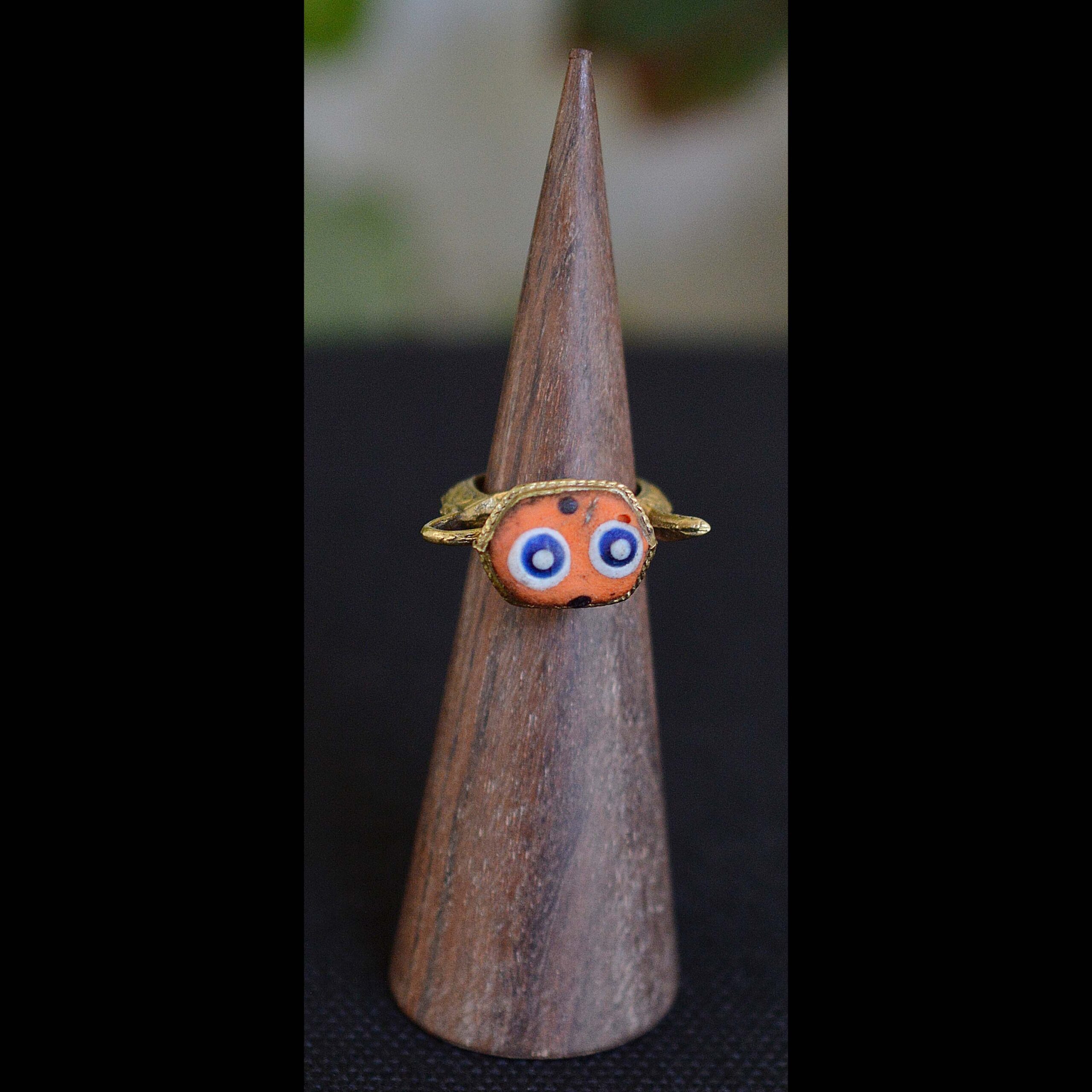 Pitcher shaped eye mosaic glass bronze Ring