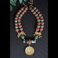 Tibetan necklace with brass almanac pendant