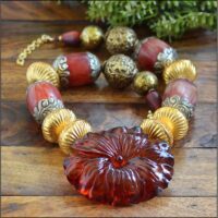 Necklace with Vintage hand carved Bakelite pendant