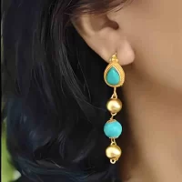 Model-wearing-Traditional-ethno-Tibetan-gilded-brass-norbu-long-earrings-right-1-600x600