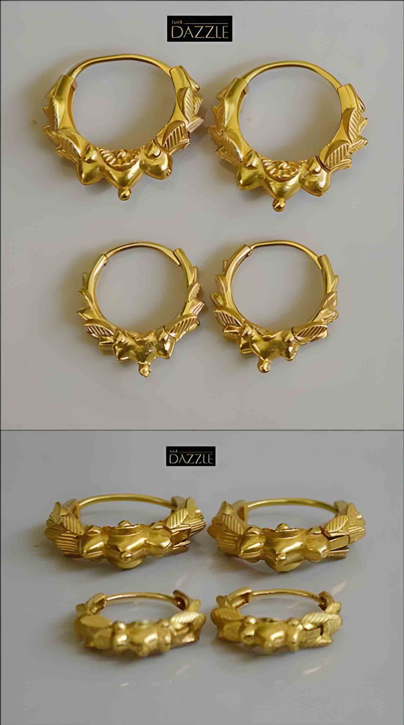 a pair of high fashion trendy earrings in gilded brass